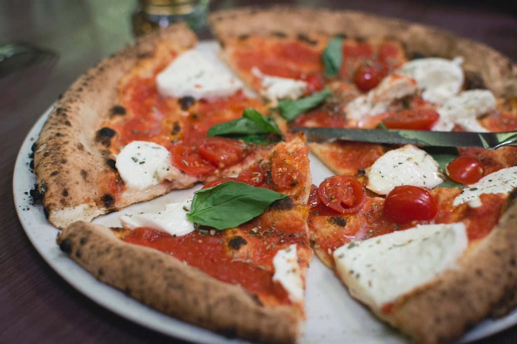 Tipos de pizza: guía de estilos italianos y cómo elegir
