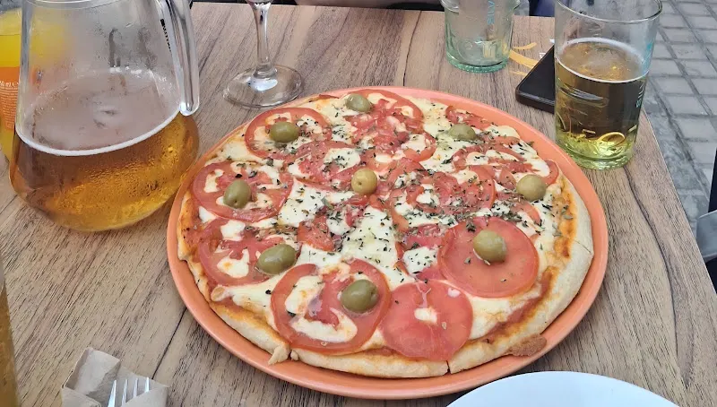 Pizzería Mira Que Te Como